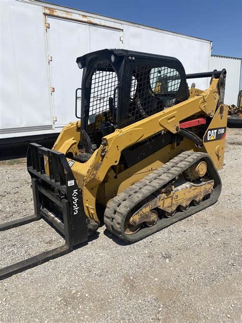 259 skid steer with bucket and forks|cat 259d price new.